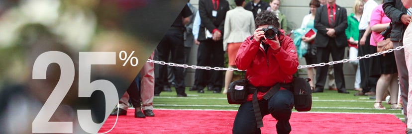 Campus photographer working at commencement