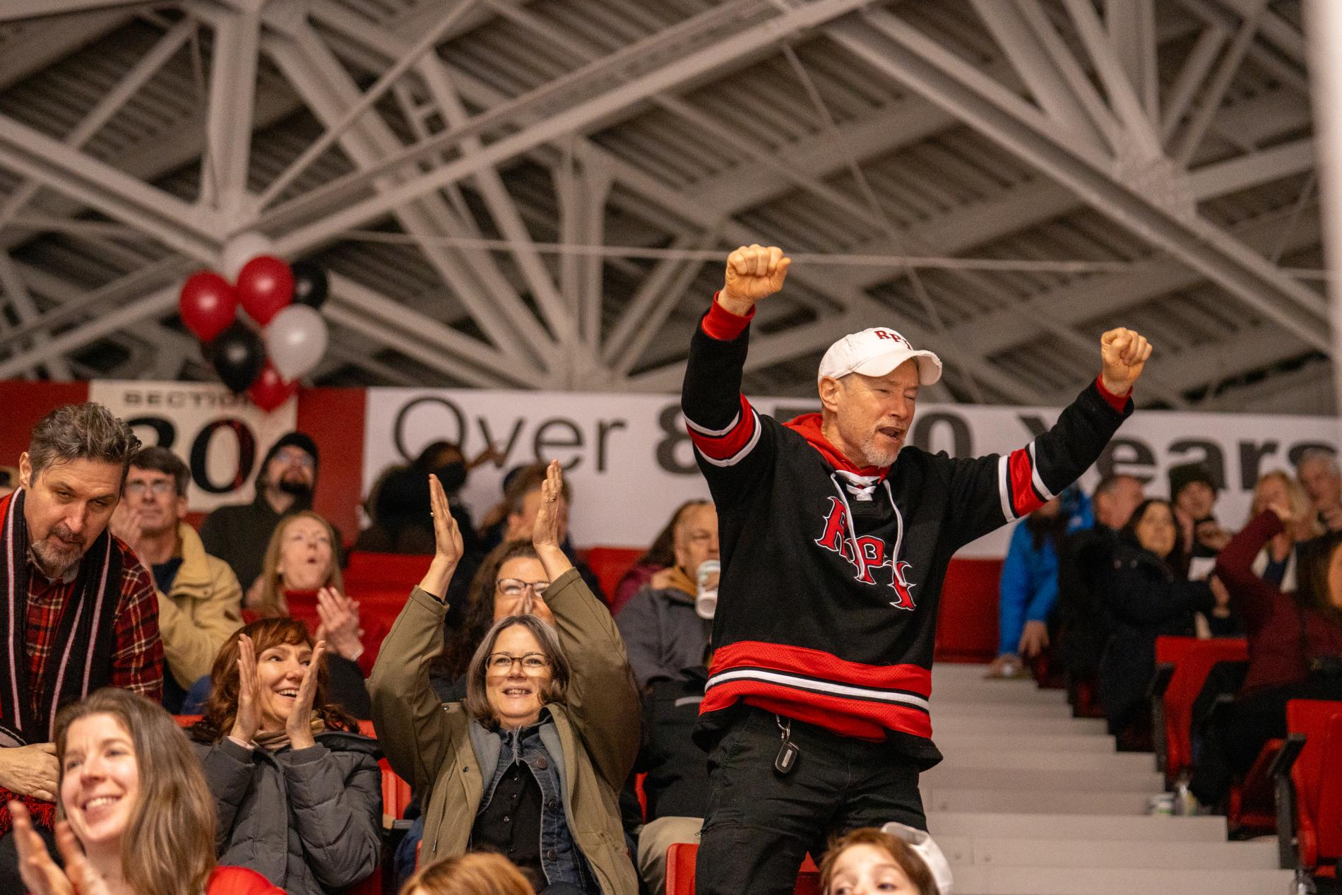 Staff Member celebrating at RPI Men's Hockey Game
