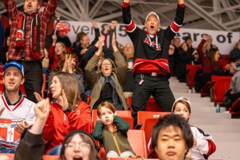 Fans cheering at RPI hockey game