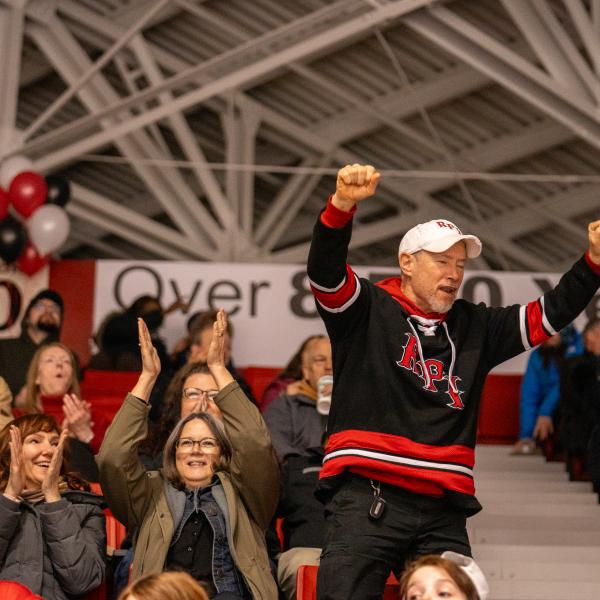 Staff Member Cheering at RPI Men's Ice Hockey Game